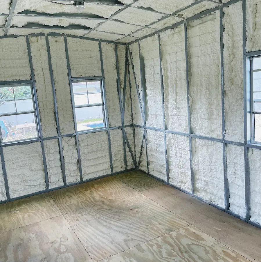Closed-cell spray foam insulation applied to wall cavities in a residential project in Williams