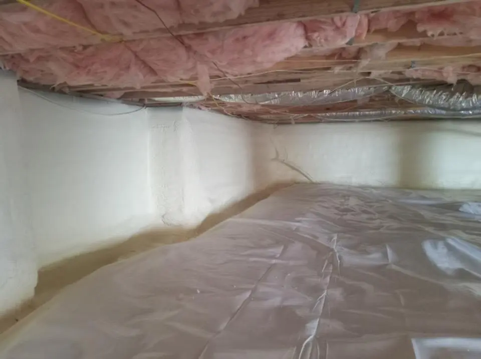 Crawl space encapsulation with closed-cell spray foam for Commercial Roof Restoration in Williams